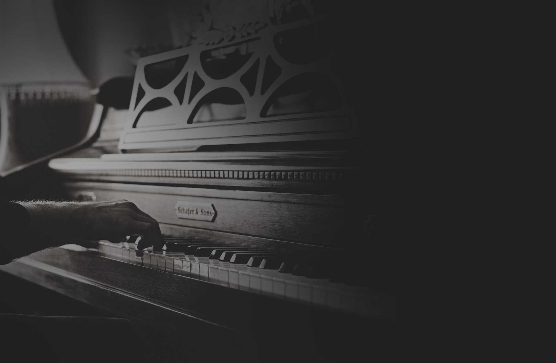 Man music black and white keyboard